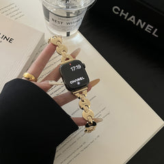 Reloj de metal con paleta redonda pequeña