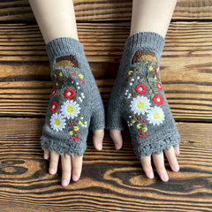 Guantes de punto largos y cálidos con pequeñas flores rojas en maceta