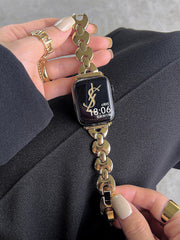 Reloj de metal con paleta redonda pequeña