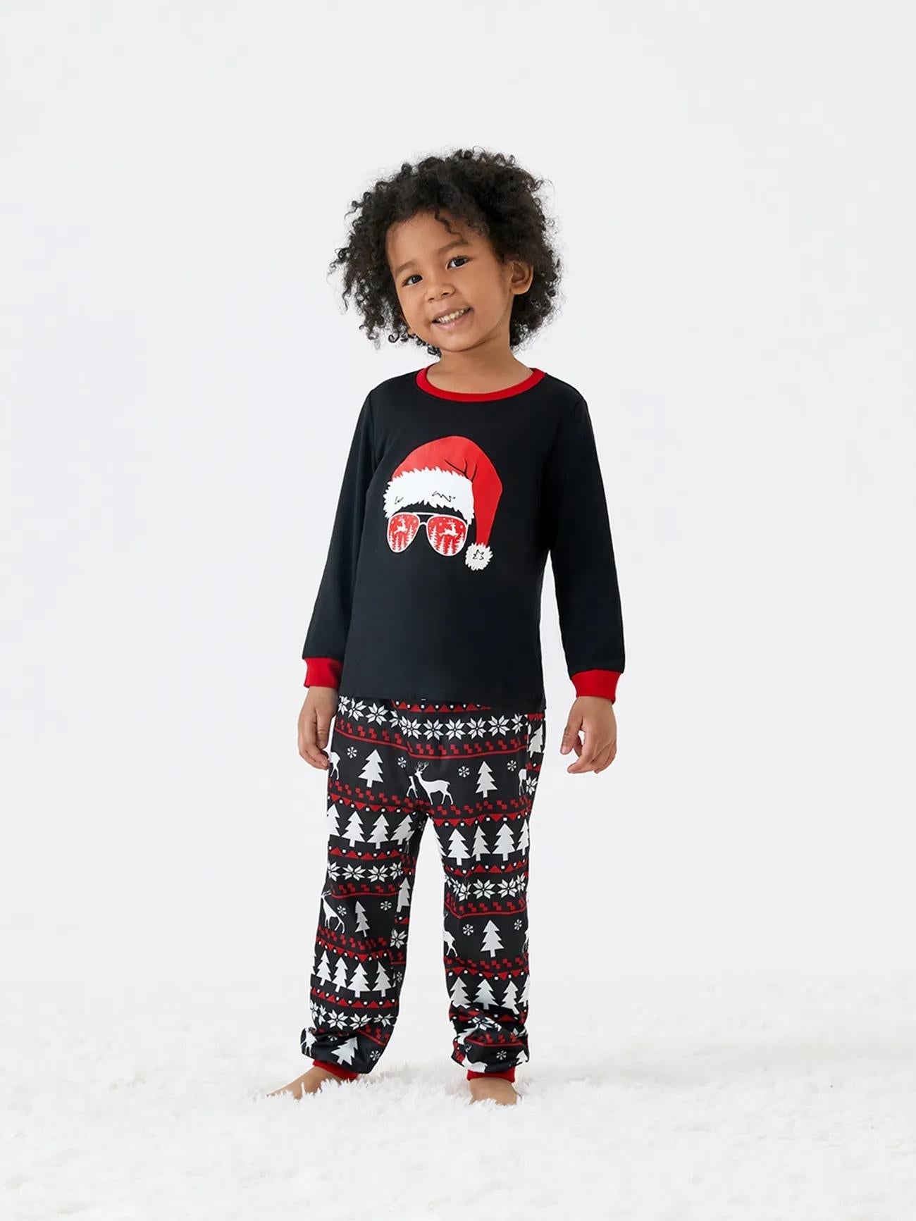 Passendes Familien-Pyjama-Set mit Weihnachtsmann- und Rentier-Print