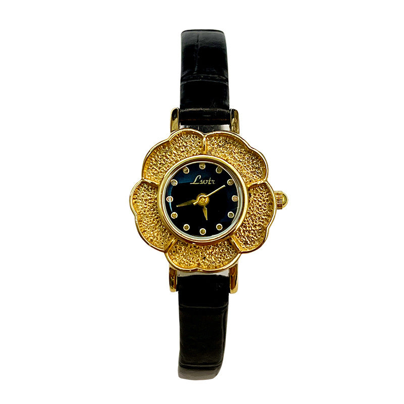 Reloj retro estilo antiguo con esfera pequeña y camelia