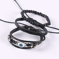 Pulsera de cuero trenzado con ojo malvado, color negro