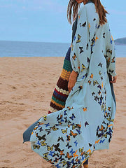 Vestido tipo kimono largo de algodón en color azul con estampado de mariposas para novia