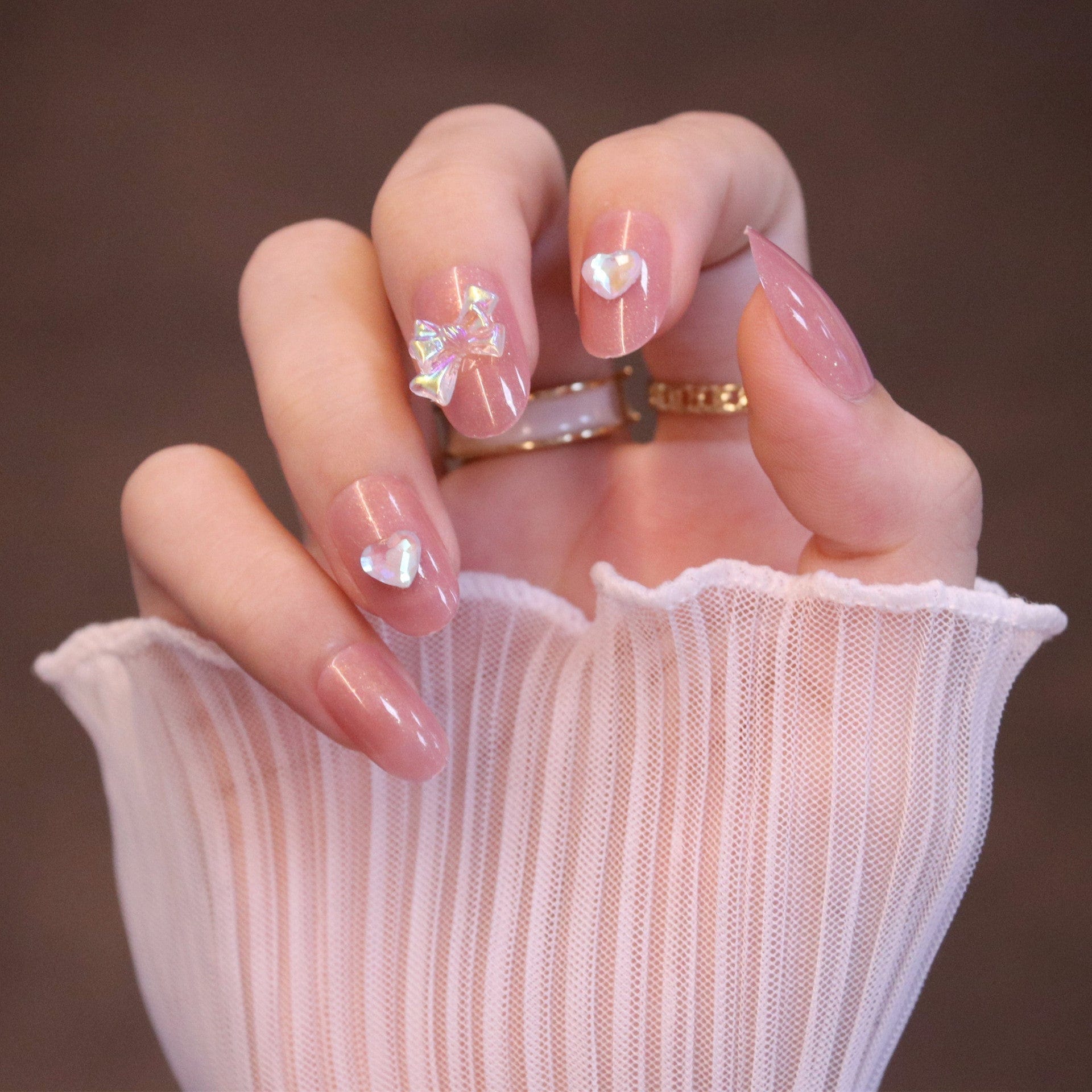 Medium Rounded Light Pink Press On Nails with Iridescent Bow and Heart