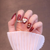 Medium Rounded Red Press On Nails with Flower and Pearl Charms