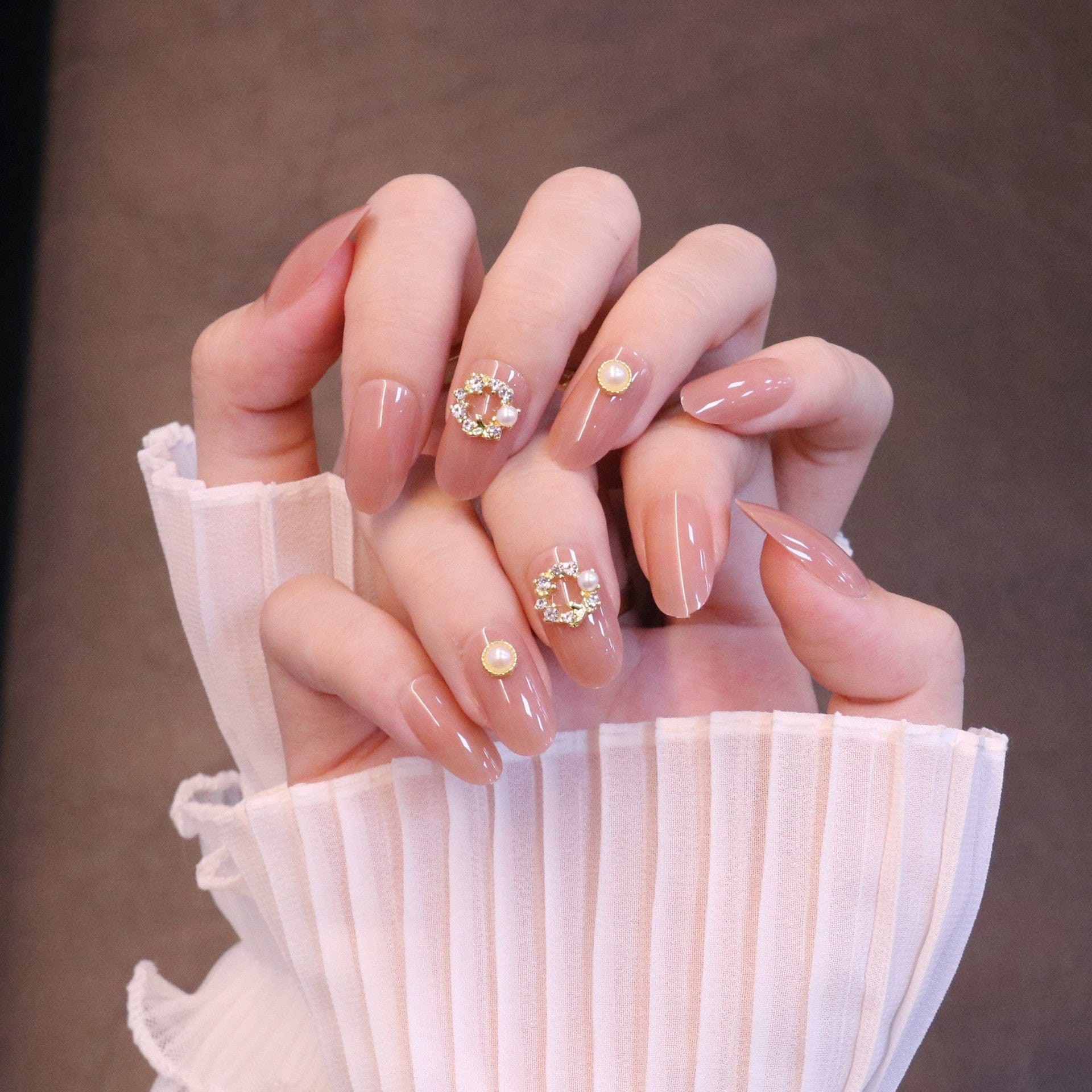 Medium Rounded Nude Press On Nails with Wreath Charm and Pearl