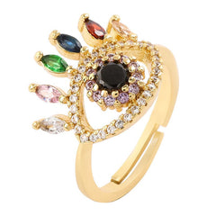 Verstellbarer Ring in Augenform mit bunten Strasssteinen in Gold