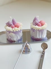 Vela decorativa de pastel de bayas moradas