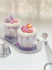 Vela decorativa de pastel de bayas moradas
