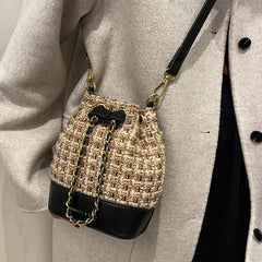 Bolso bandolera de tweed tejido con cordón ajustable