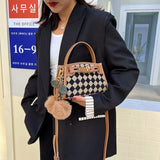 Small Checkered Handbag with Belt Clasp and Cherry Pompom