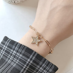 Pulsera colgante de estrella dorada