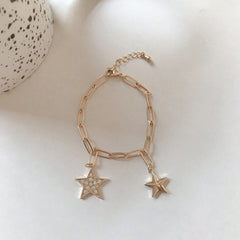 Pulsera colgante de estrella dorada