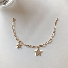 Pulsera colgante de estrella dorada