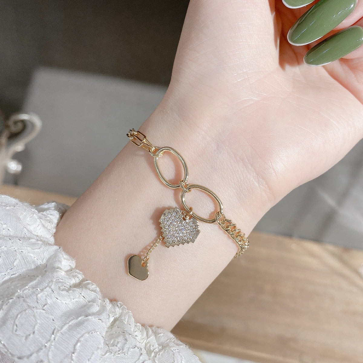 Pulsera con colgante de corazón de oro