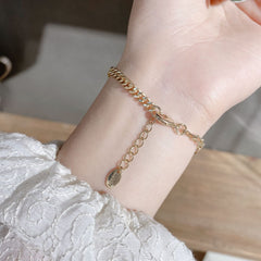 Pulsera con colgante de corazón de oro