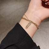 Double Layered Gold Chain Bracelet with Safety Pin Charm