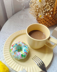 Vela decorativa de donas con chispas de arcoíris
