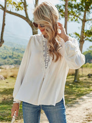 Blusa de encaje con escote en V