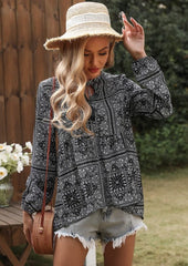 Bluse mit geometrischem Print und Bindekragen