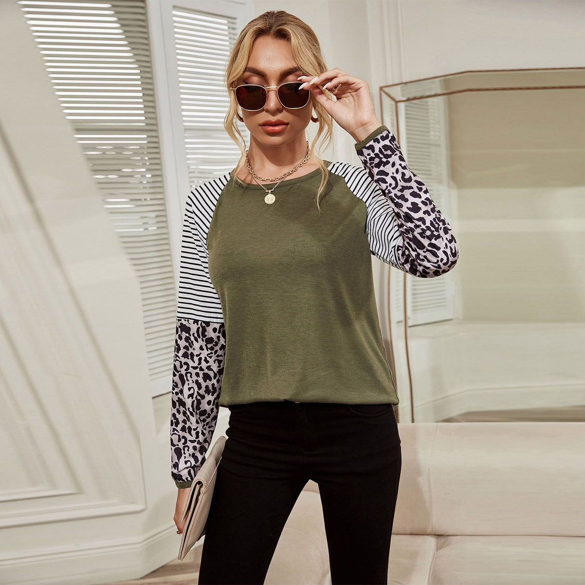 Sudadera con mangas raglán y estampados mixtos 