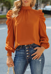 Blusa lisa con mangas gigot