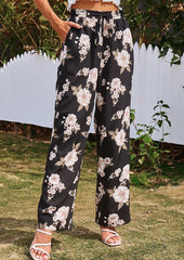 Pantalones con cintura con cordón y estampado floral