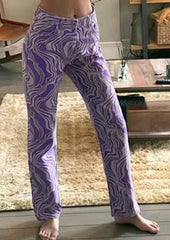 Pantalones de tiro alto con estampado abstracto morado