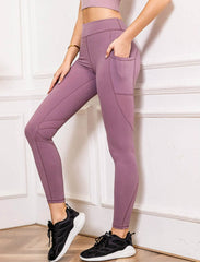 Leggings moldeadores con costuras elevadas y bolsillos