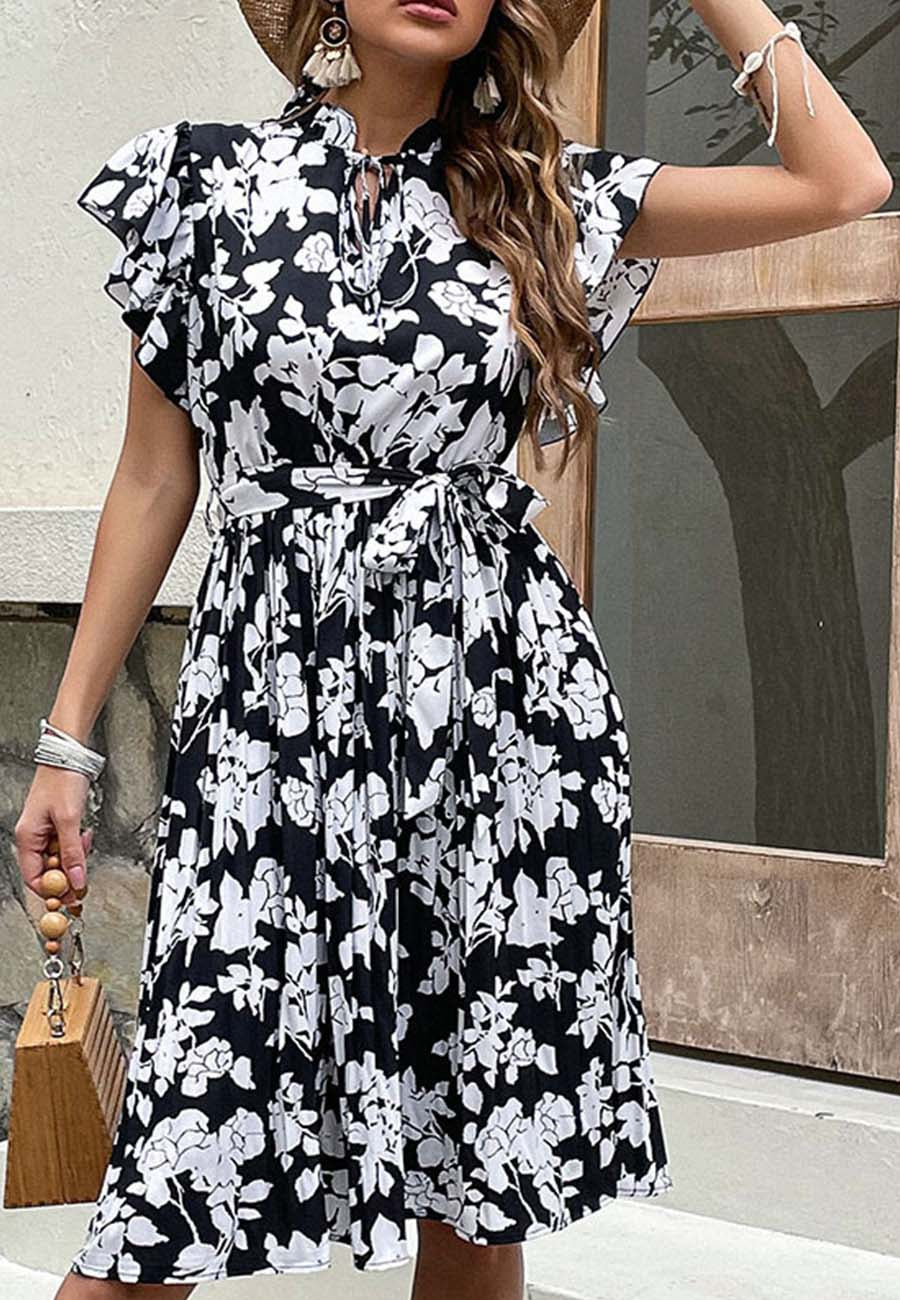 Vestido con mangas con volantes y cuello anudado