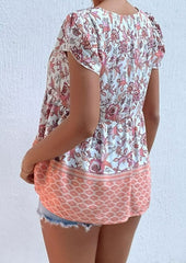 Blusa bohemia peplum con cuello anudado