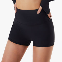 Shorts de fitness acanalados de tiro alto que realzan el cuerpo