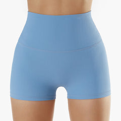 Shorts de fitness acanalados de tiro alto que realzan el cuerpo