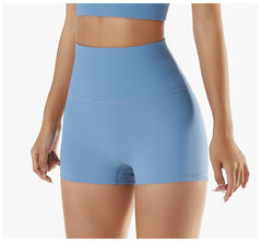 Shorts de fitness acanalados de tiro alto que realzan el cuerpo