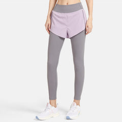 Leggings falsos de dos piezas con pantalones cortos deportivos