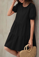 Vestido recto escalonado con mangas abullonadas