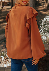 Bluse mit plissierter Vorderseite und Rüschen an den Schultern