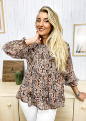 Blusa fluida con dobladillo con volantes estampados