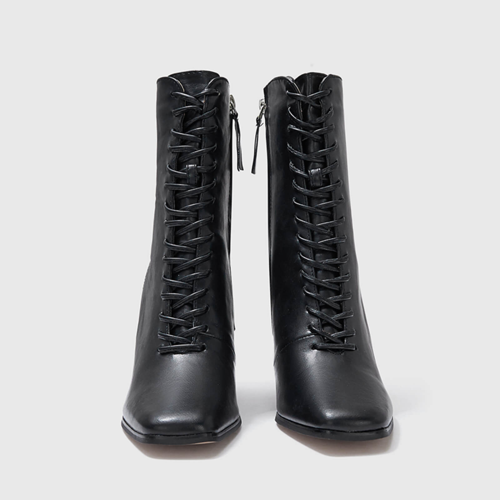 Botines elegantes con cordones y tacón de bloque fino 
