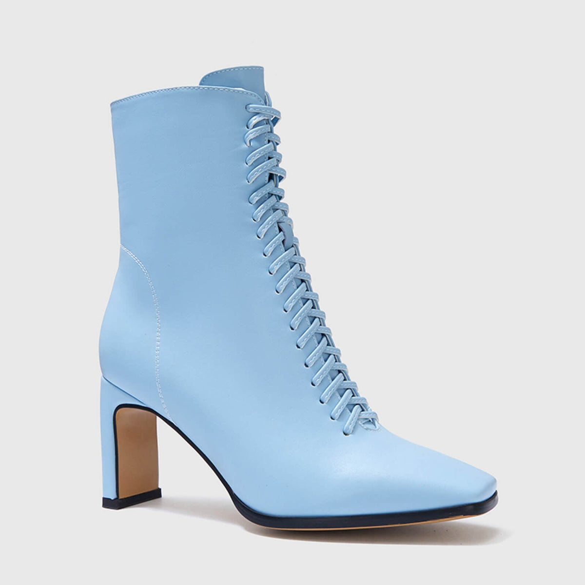 Botines elegantes con cordones y tacón de bloque fino 