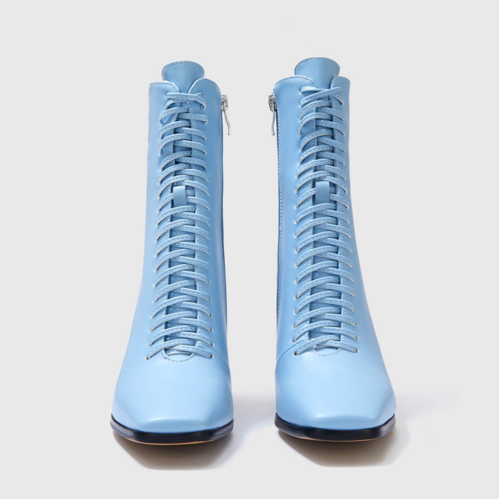Botines elegantes con cordones y tacón de bloque fino 
