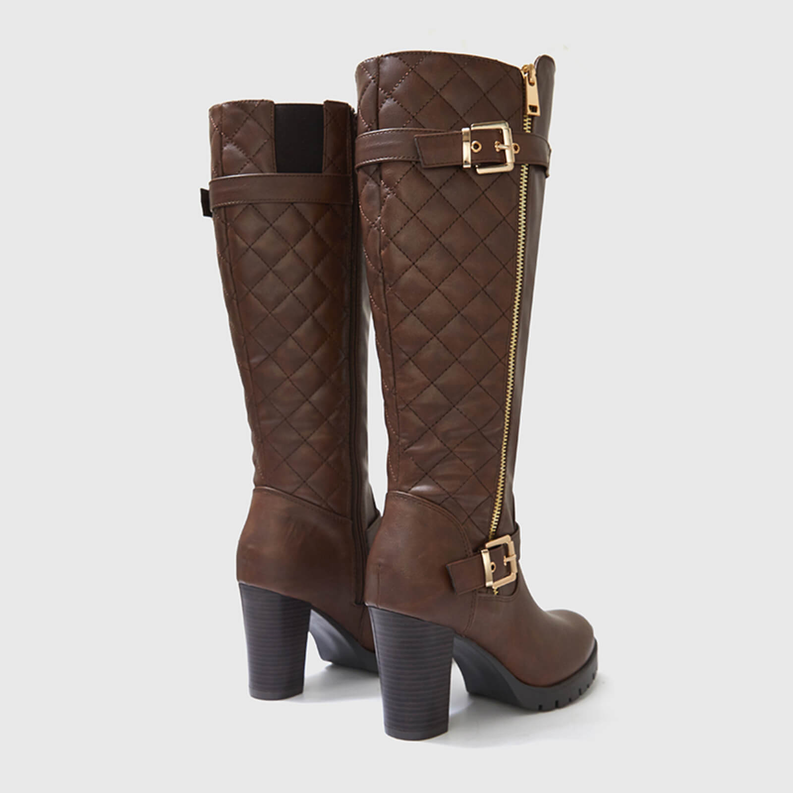Botas altas hasta la rodilla gruesas, acolchadas y de pantorrilla ancha con hebilla
