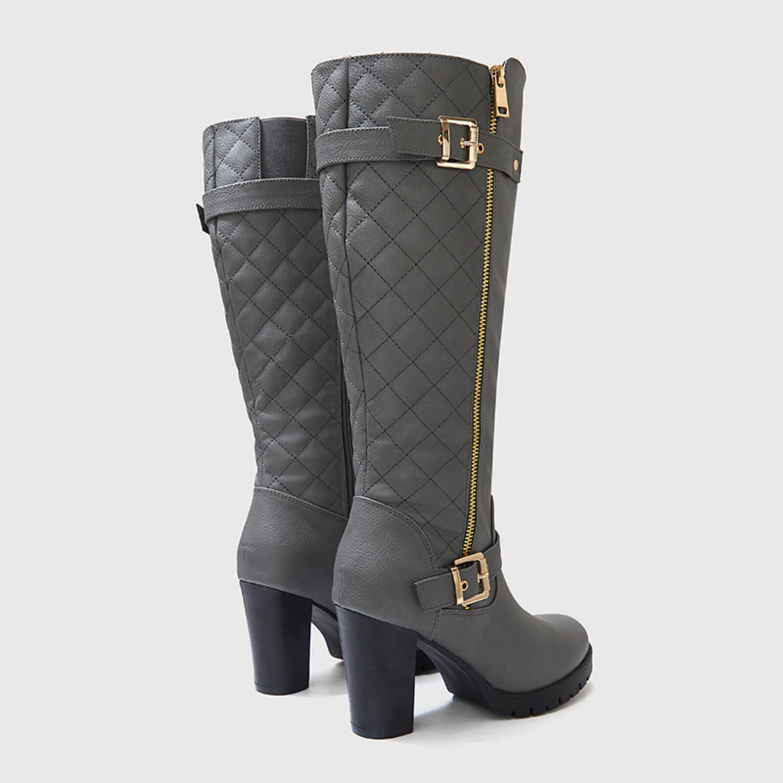 Botas altas hasta la rodilla gruesas, acolchadas y de pantorrilla ancha con hebilla